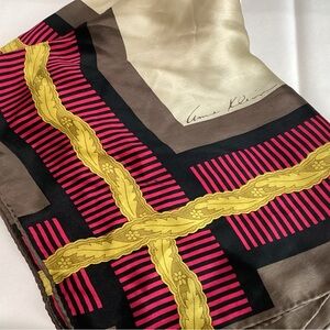Vintage Ann Klein silk scarf 1970s. Its colors gold,black and red pattern.